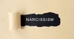 A person recognizing narcissistic behavior in someone close showing body language cues